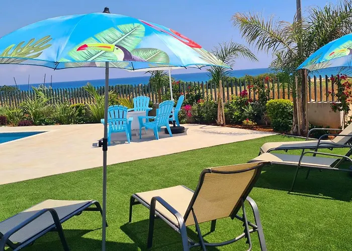 By The - Emerald Seaview